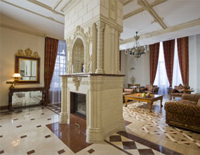 A Large French Louis XVI Style Carrara Marble Antique Decorative Electric Fireplace Mantel